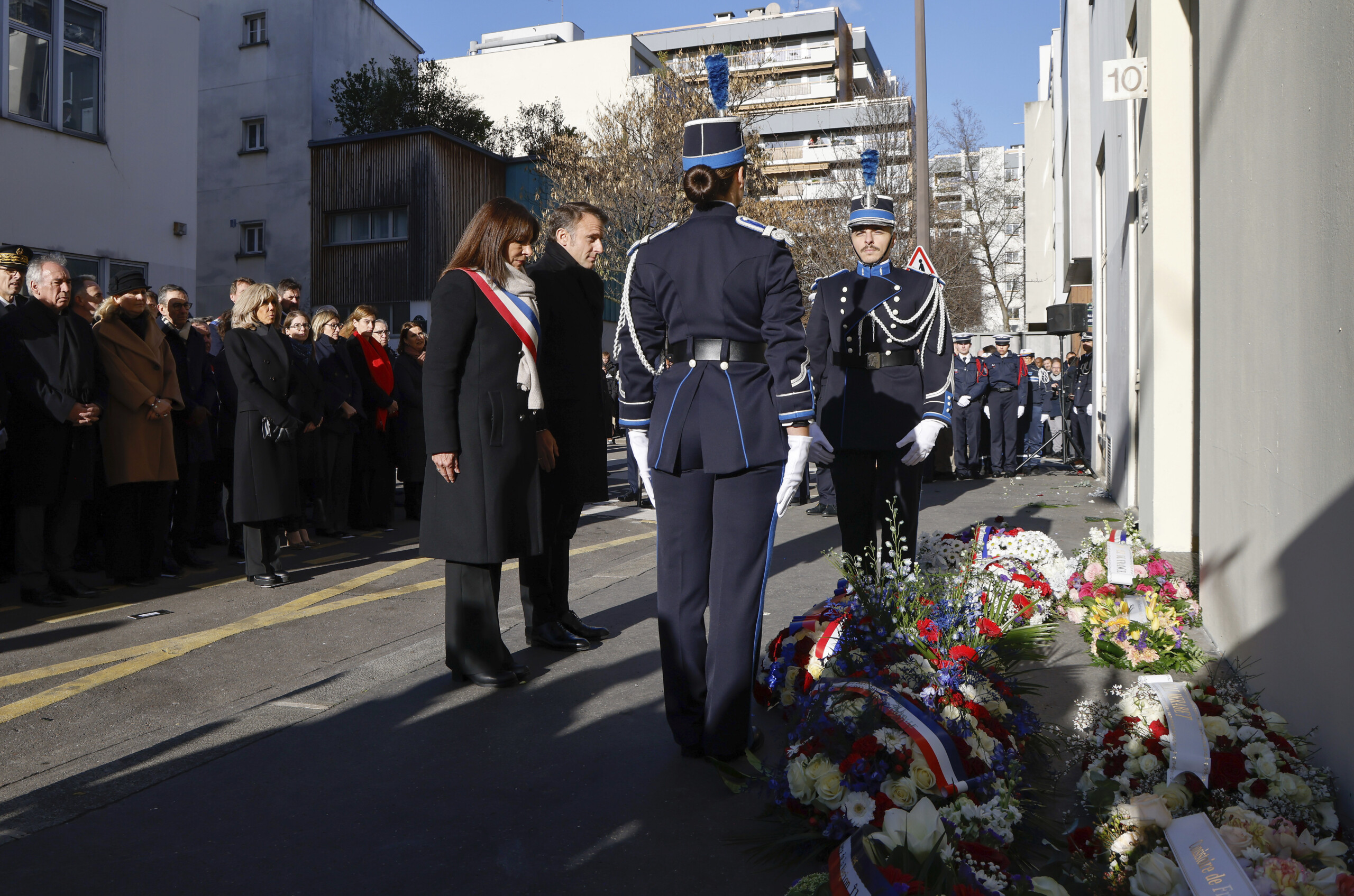 france macron lays wreath 10 years after charlie hebdo scaled