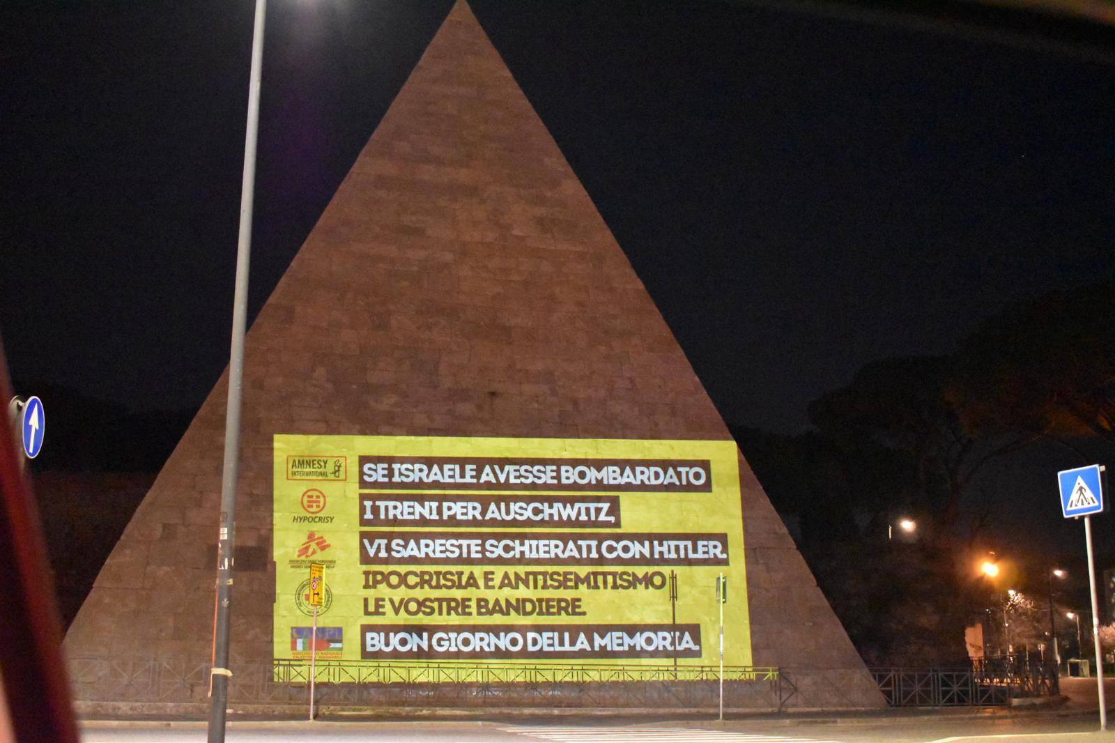 memorial day anti ngo and anti anpi messages projected in rome overnight