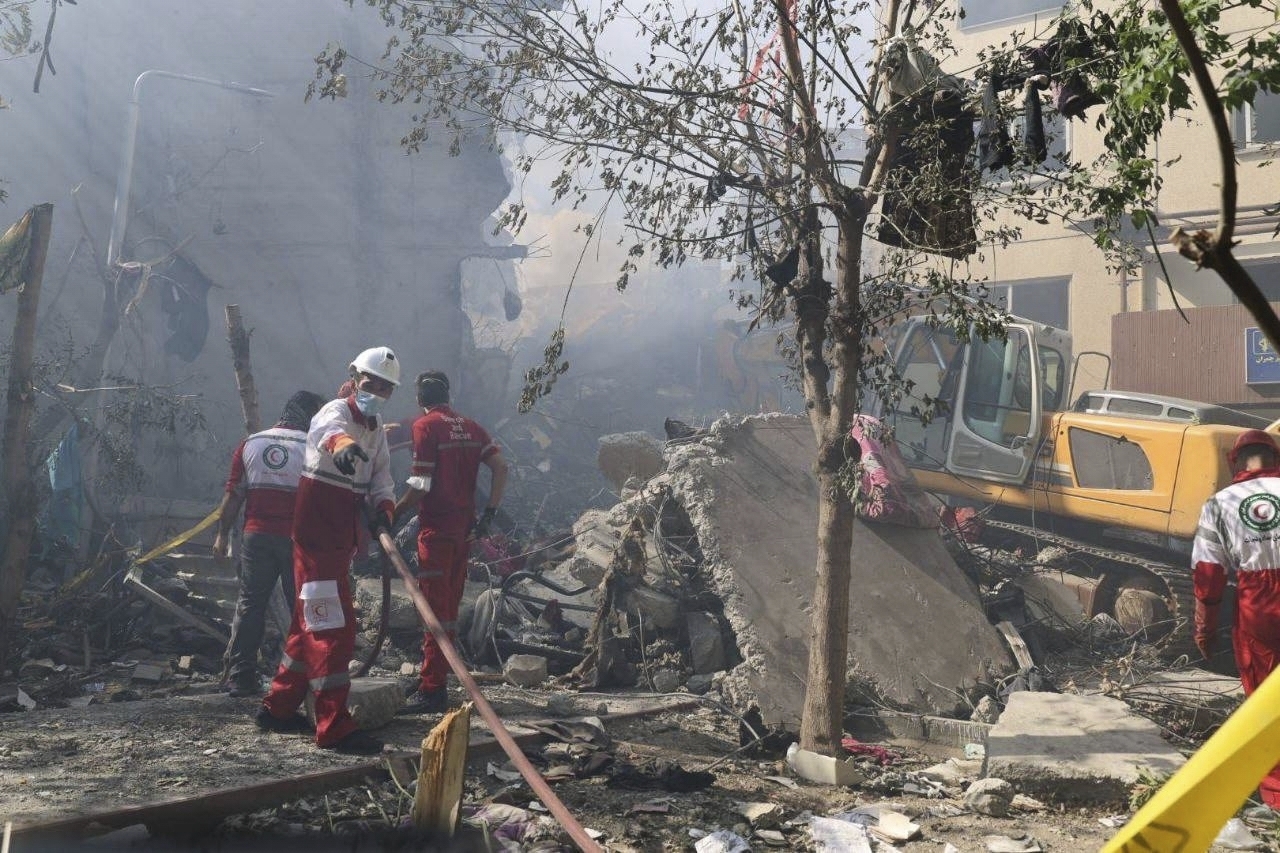 iran media 60 dead including 20 children in building collapse hit by israel