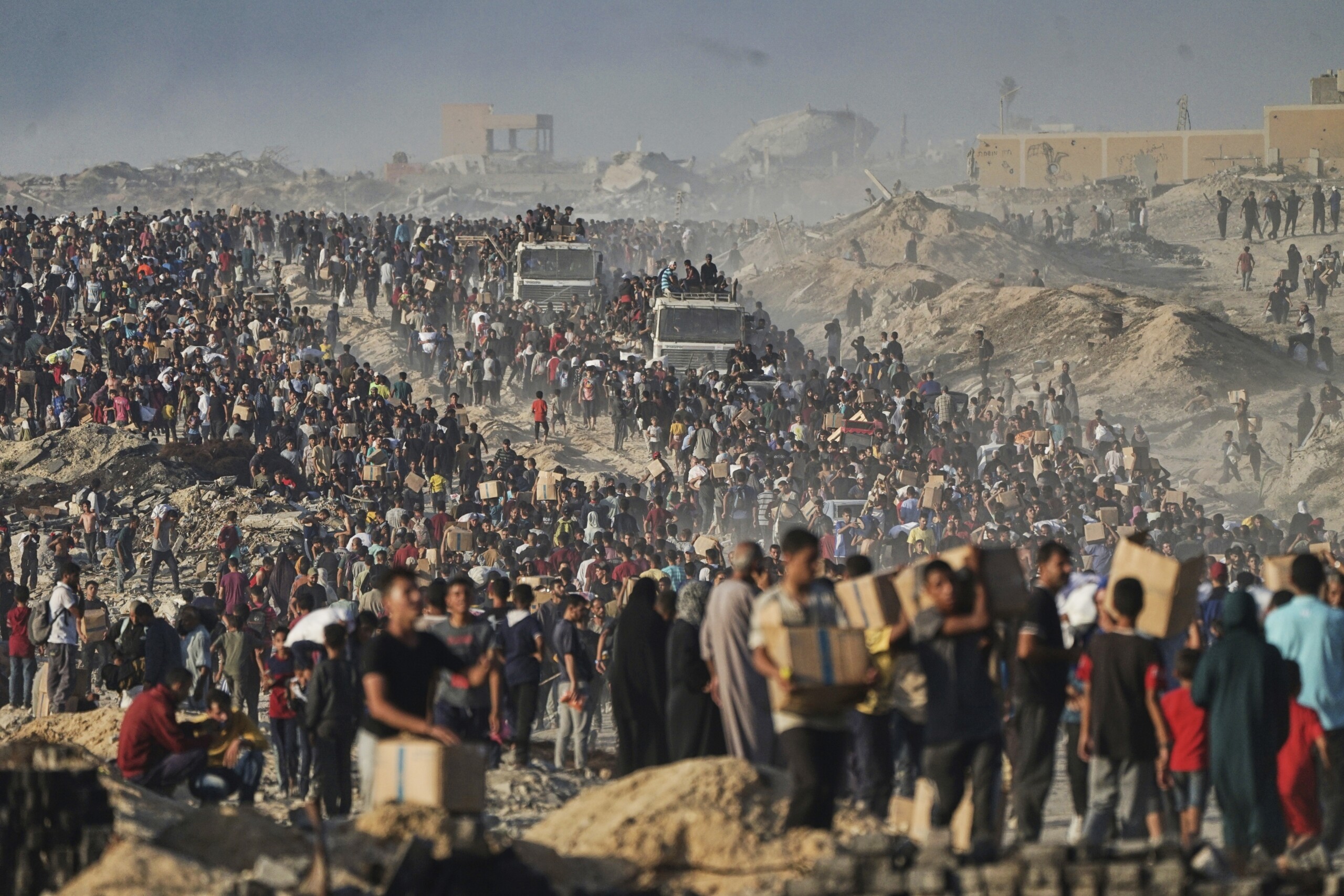 gaza media 24 killed in israeli raids ten were waiting in line for food scaled