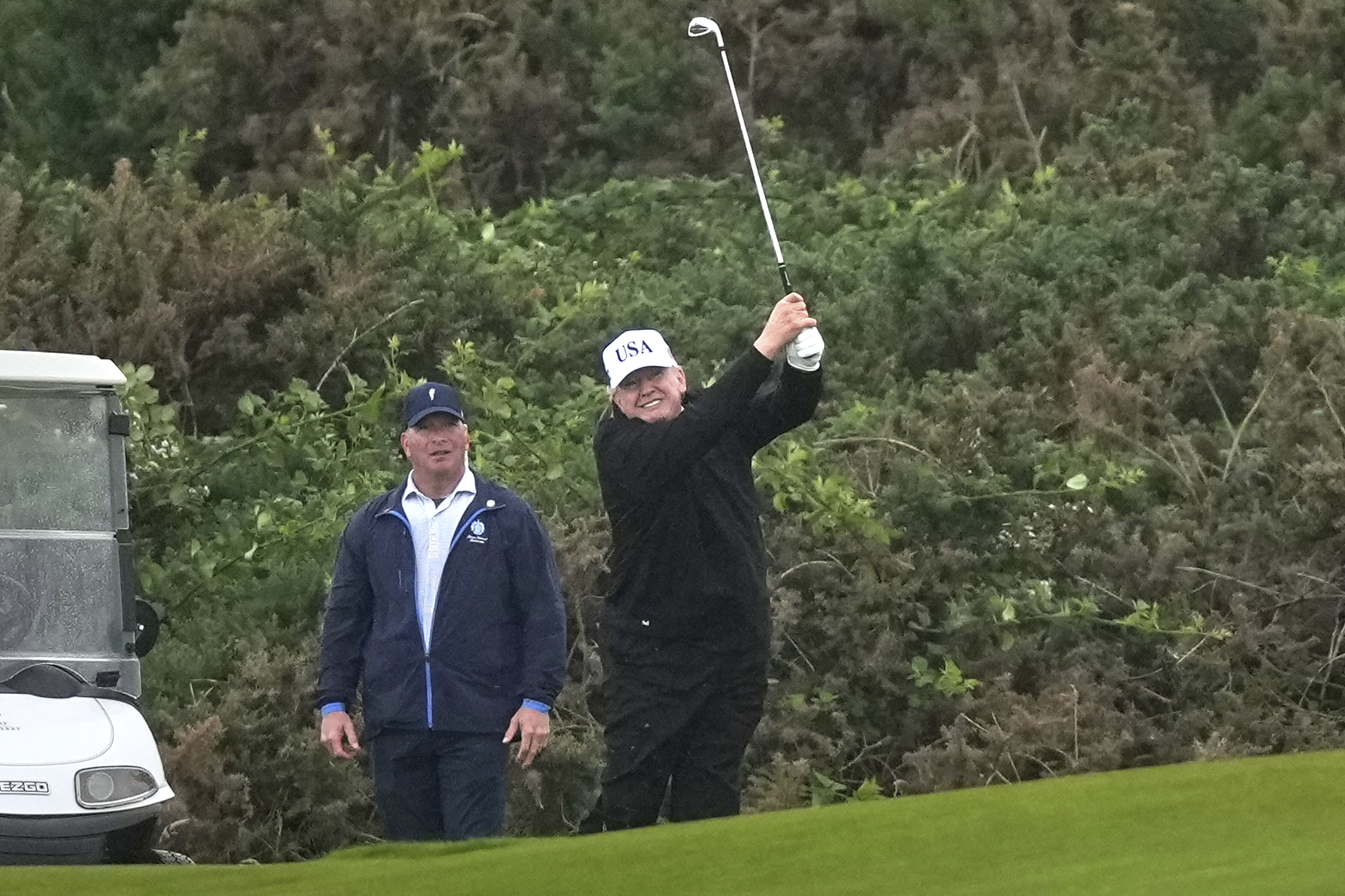 trump plays golf in scotland protesters take to the streets against his visit