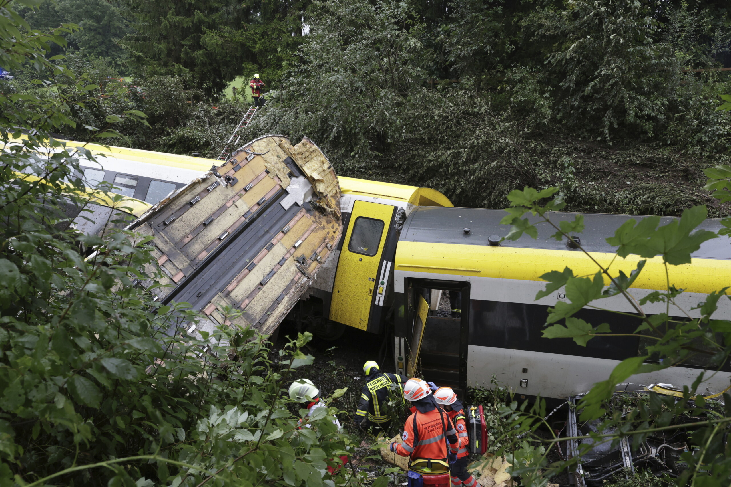 germany police say landslide after heavy rain likely caused train derailment scaled