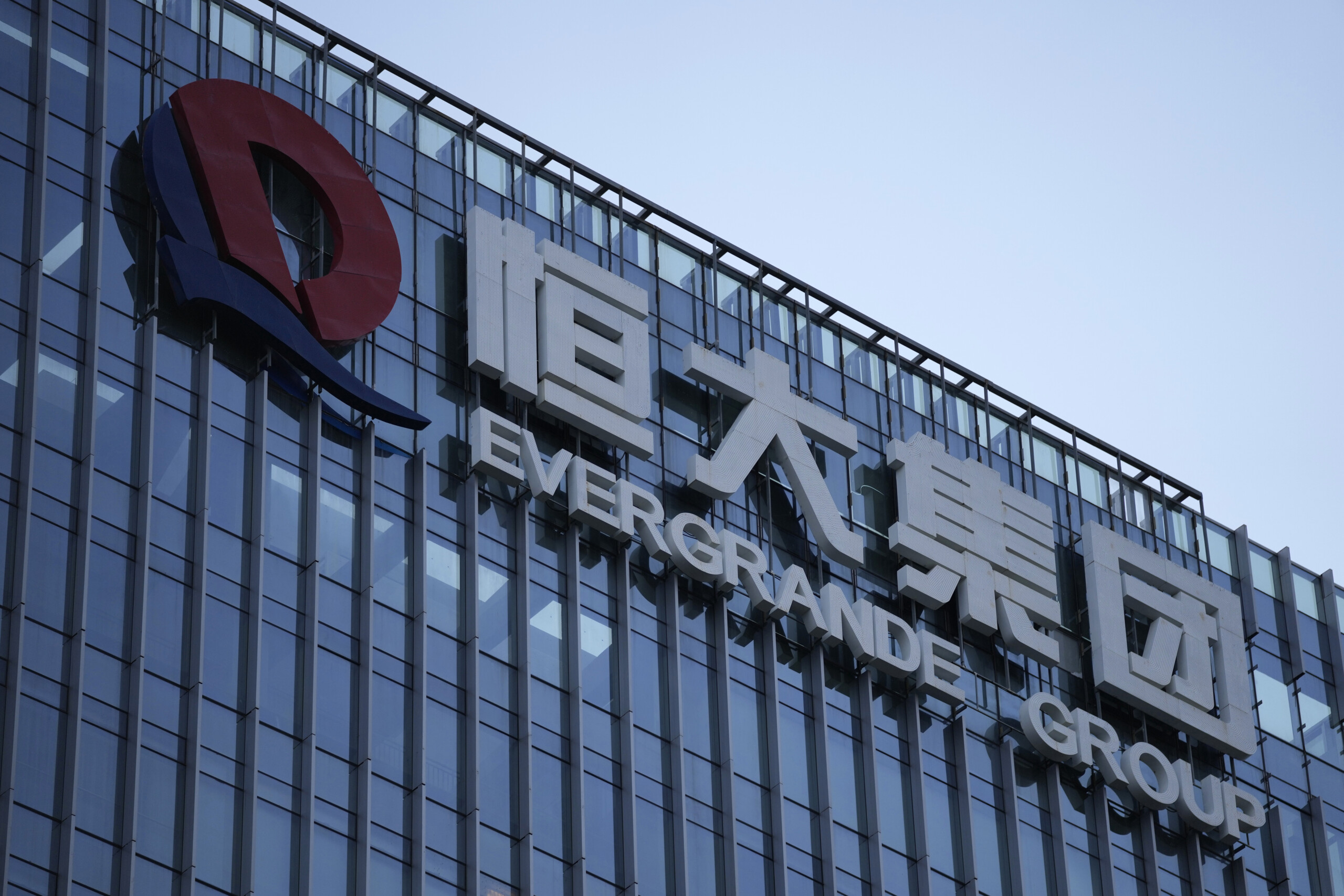 evergrande hong kong stock exchange delists company from trading scaled