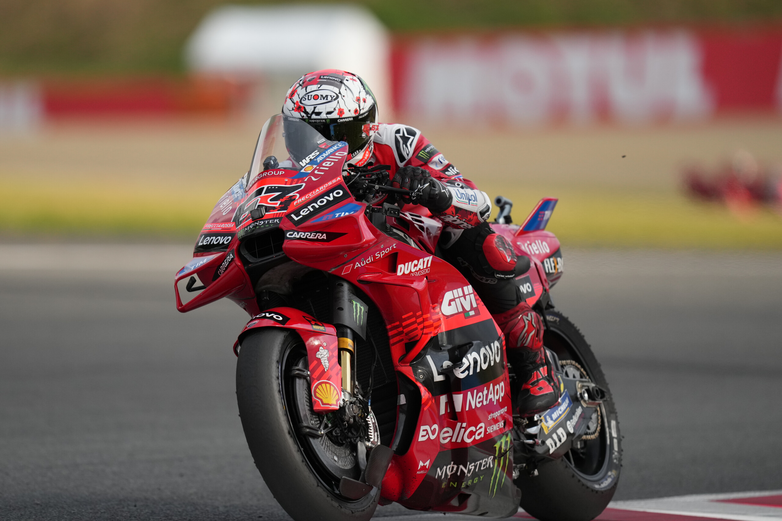 motogp bagnaia takes pole position in malaysia ducati dominates front row with alex marquez and morbidelli scaled