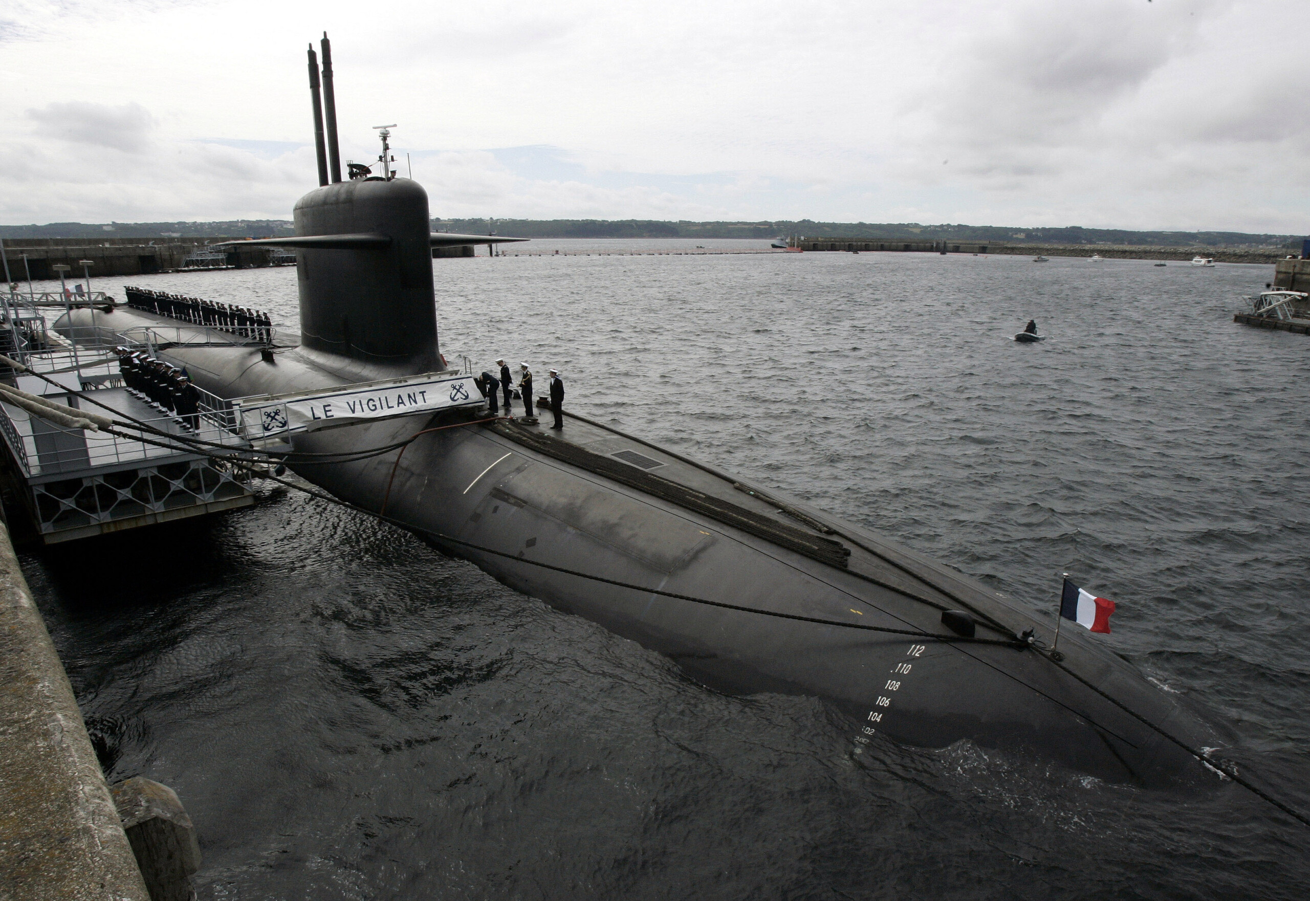france media drones fly over submarine naval base artillery responds scaled