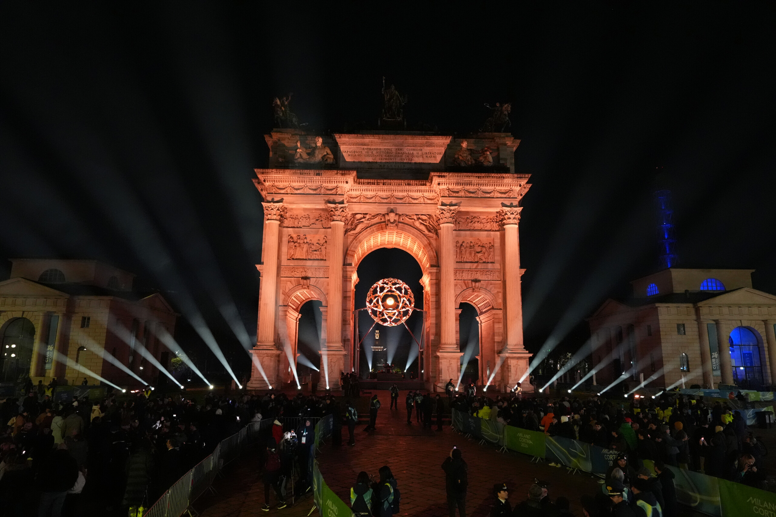 milan cortina tomba and compagnoni light the olympic cauldron at the arco della pace in milan scaled