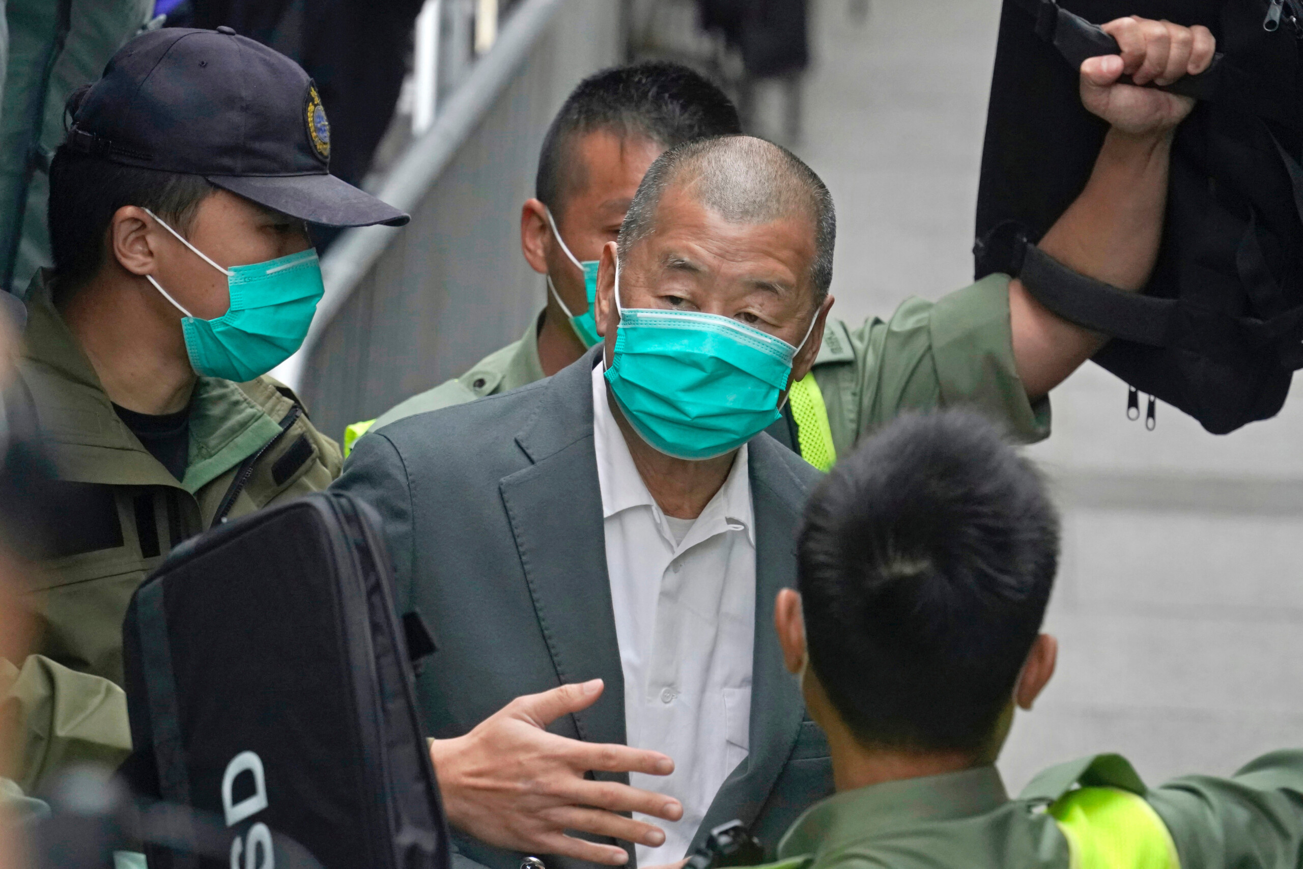 hong kong pro democracy tycoon jimmy lai sentenced to 20 years in prison scaled