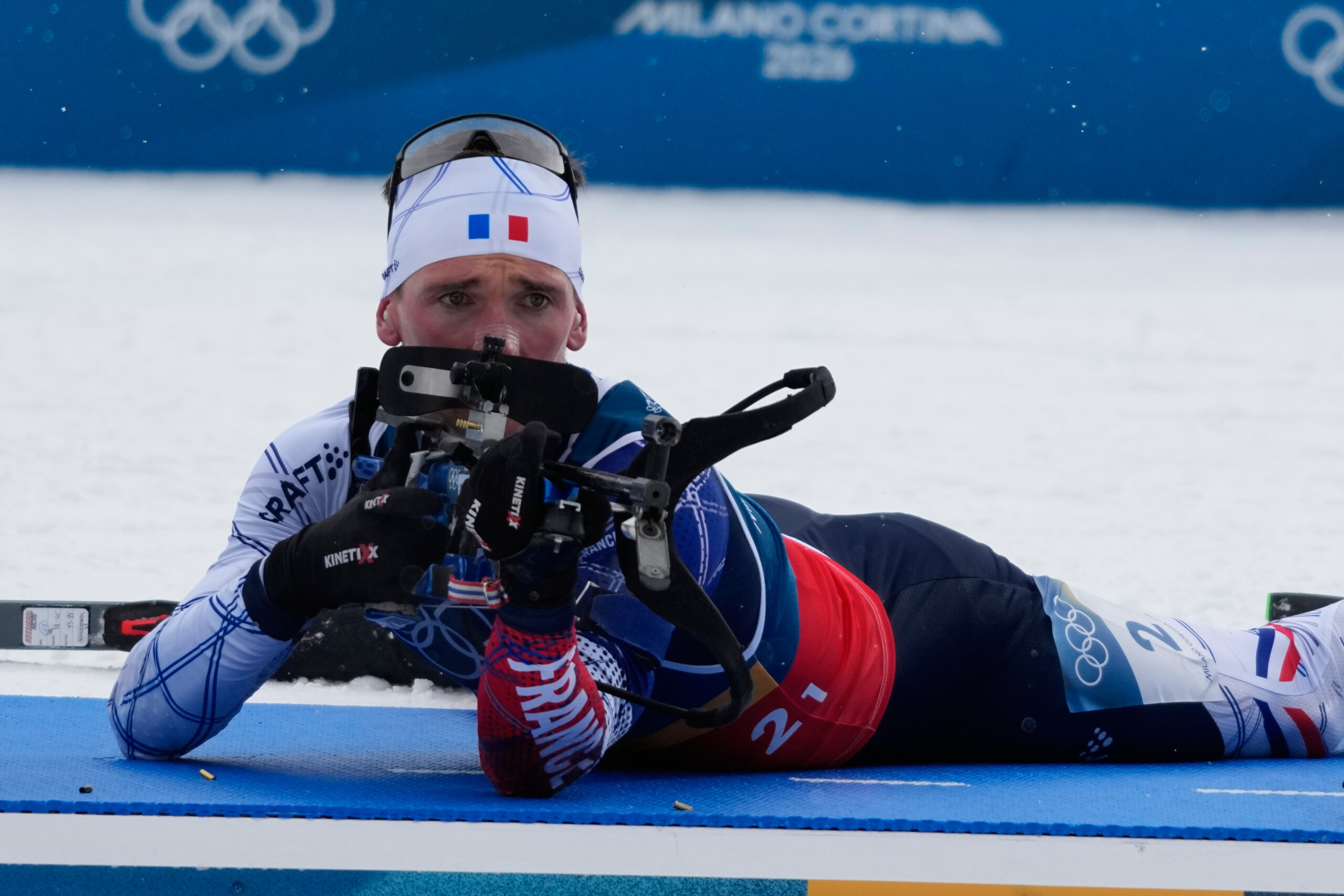 milan cortina biathlon france wins gold in mens relay italy finishes 14th scaled
