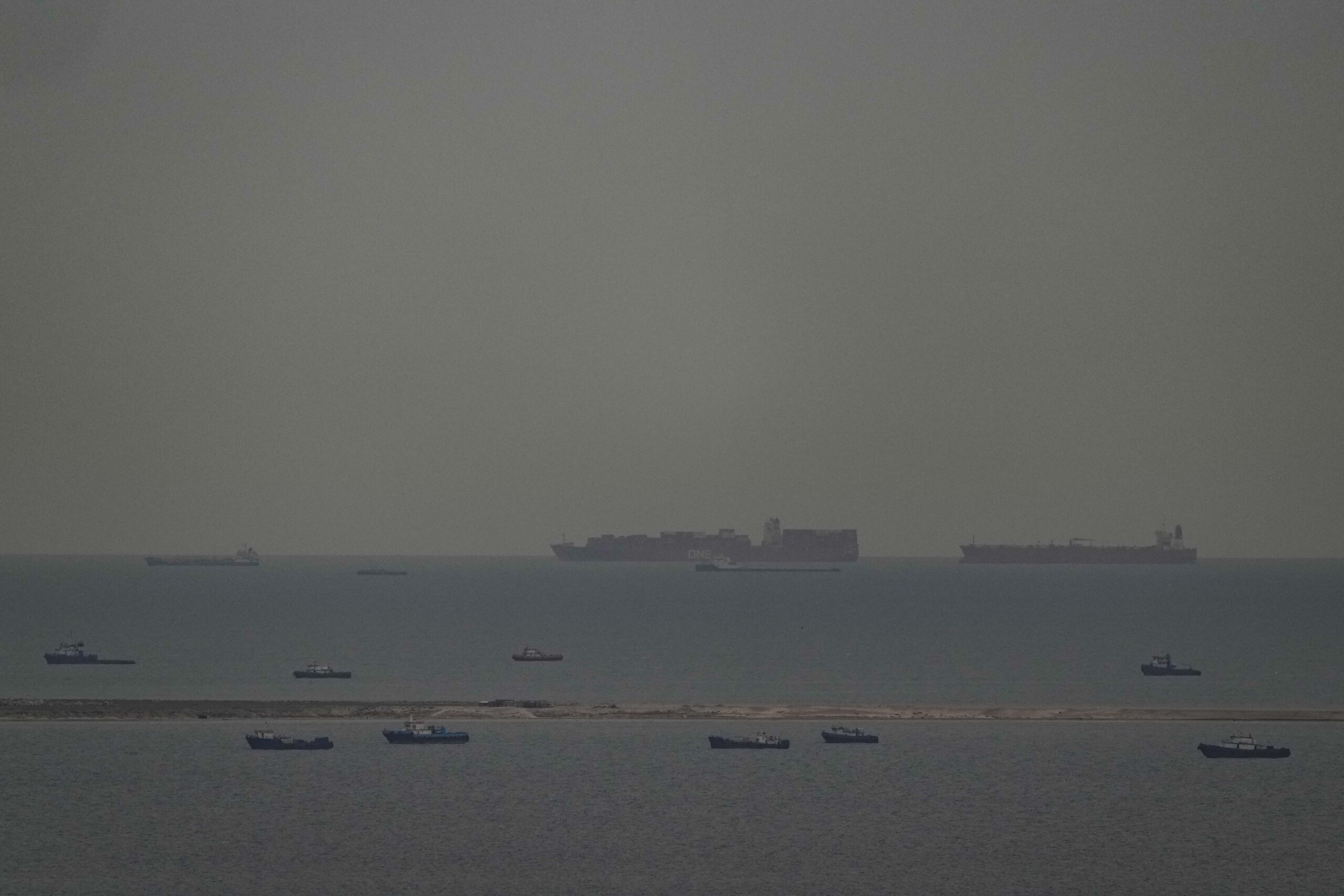 french container ship passes through the strait of hormuz scaled