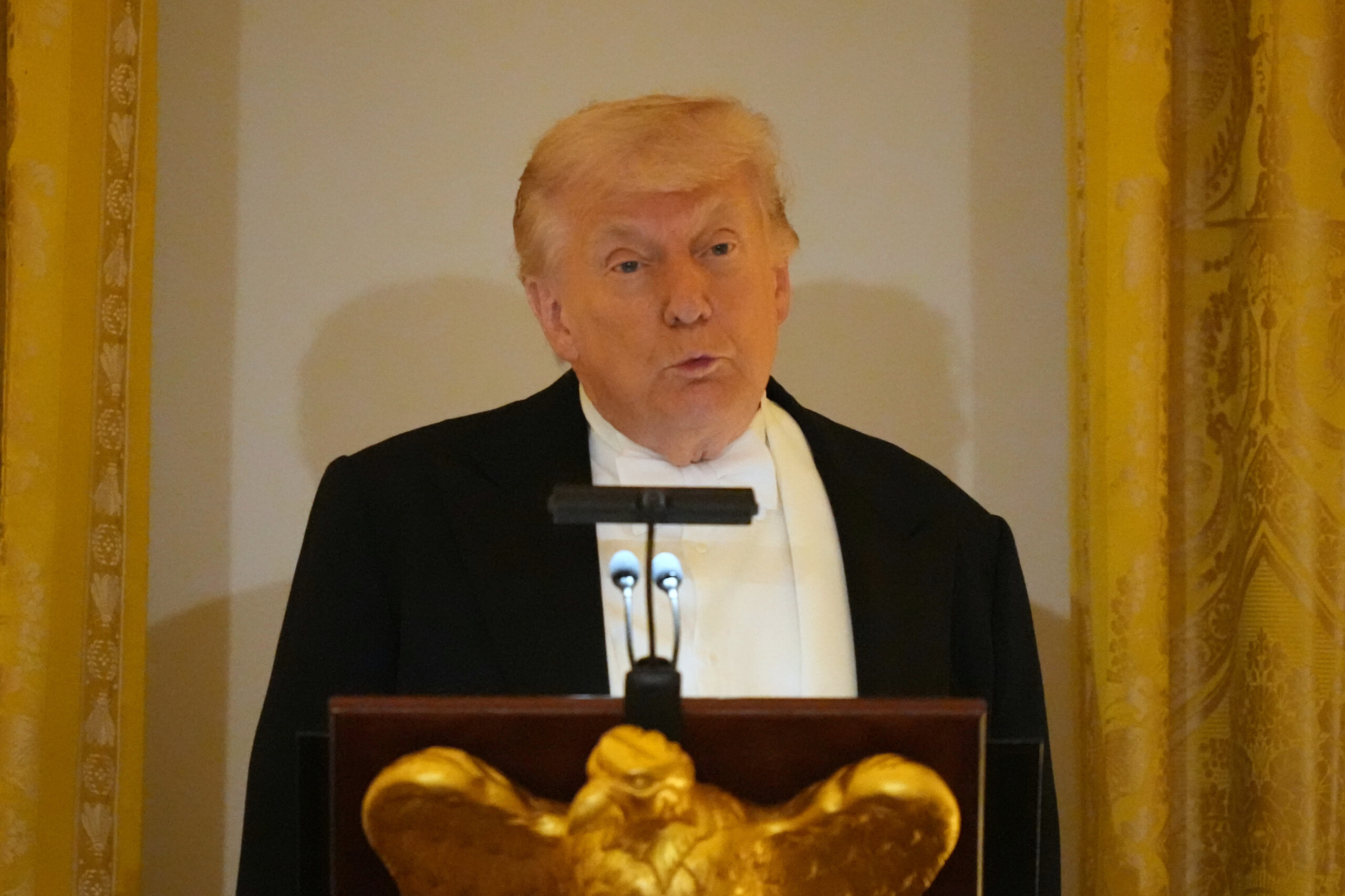 iran trump posts photo with a machine gun tehran needs to wake up scaled